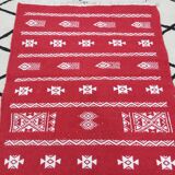 Handmade red and white carpet