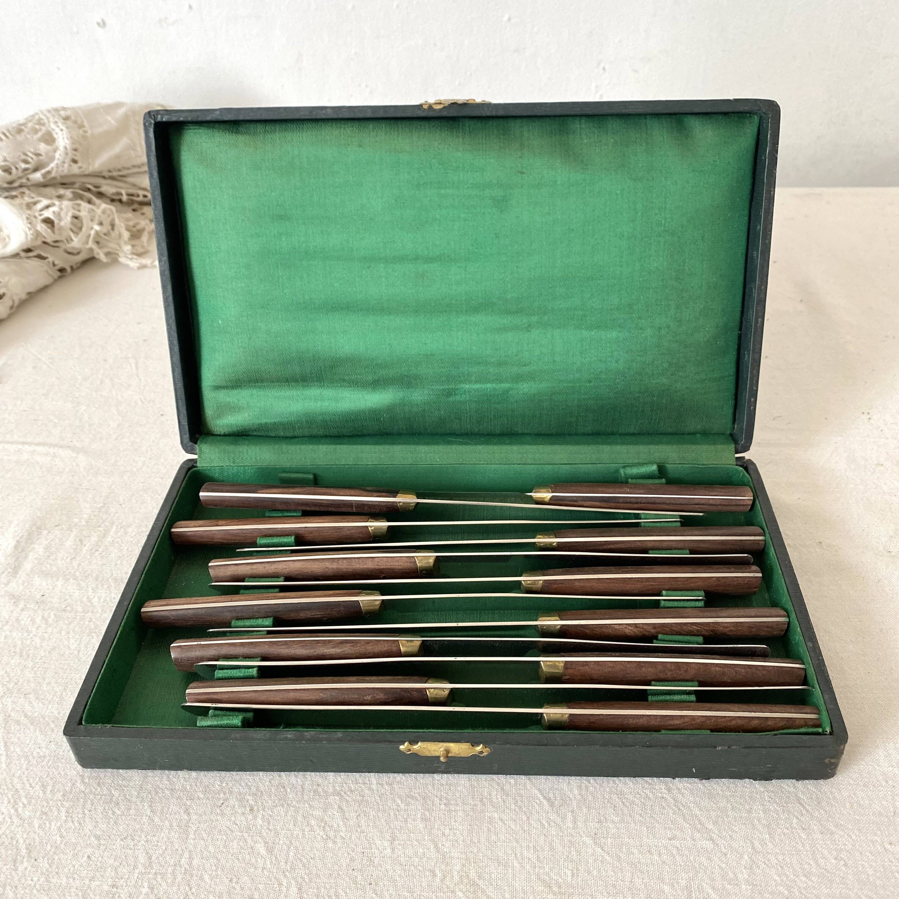 Vintage stainless steel and wood knives