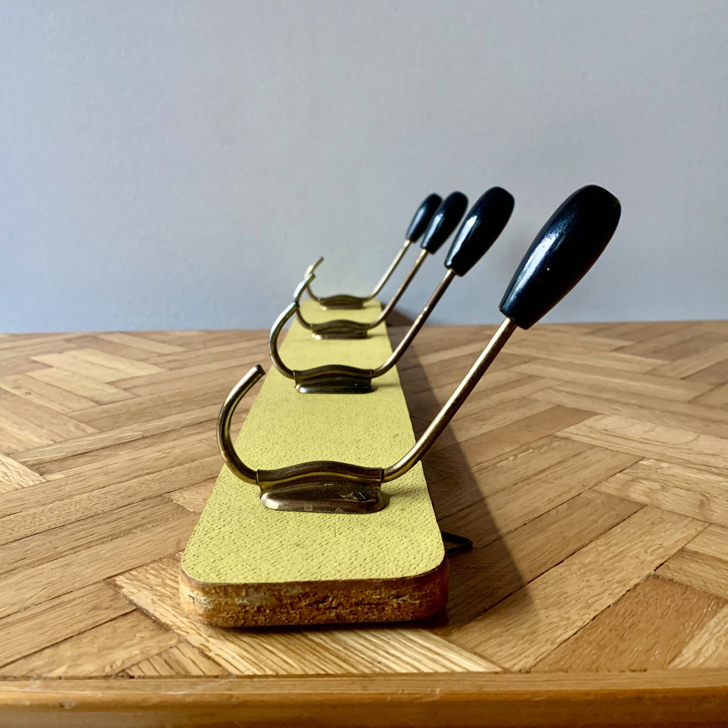 Vintage yellow wall coat rack - four hooks - 1950s