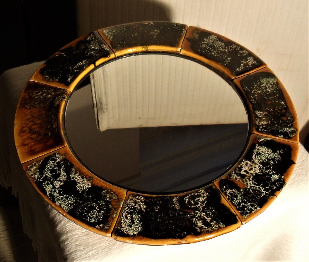 Old vintage round ceramic mirror