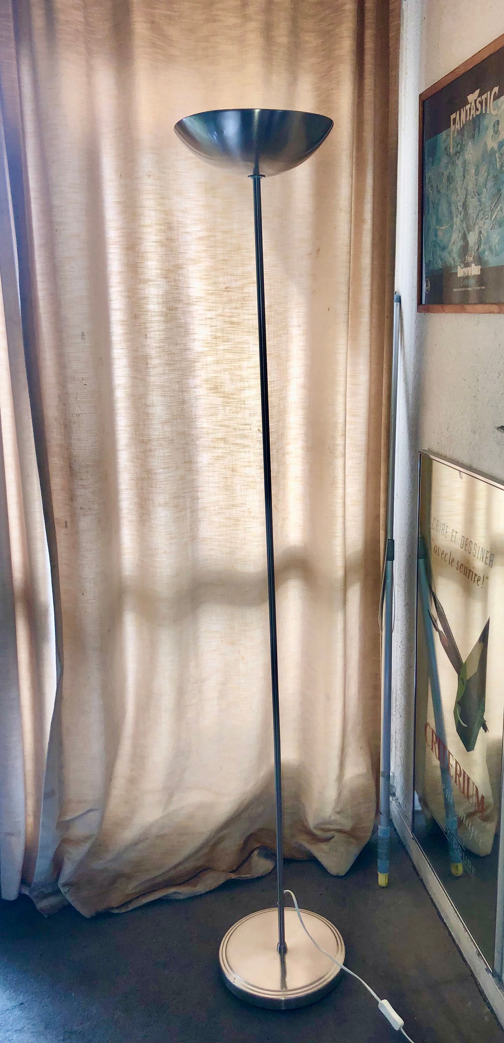 Discreet brushed metal floor lamp