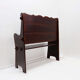 Vintage solid wood church bench from the 20th century.