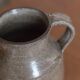 Signed sandstone pitcher