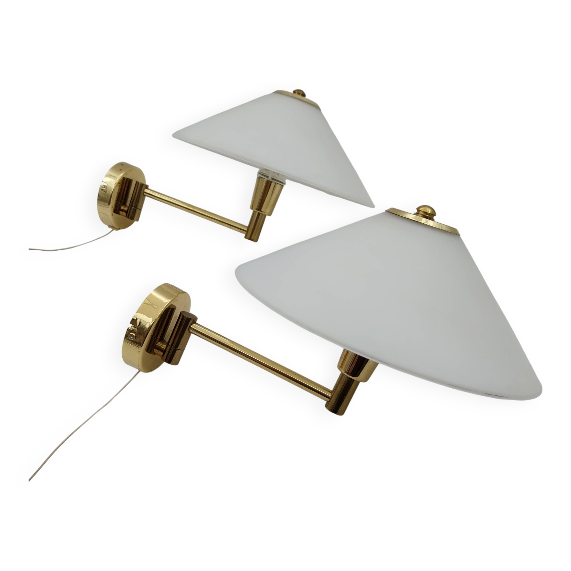 Pair of articulated arm wall lights in brass with opaline globe