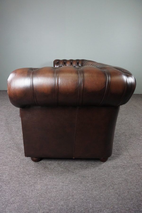 Chesterfield sofa in cowhide, 4 seats