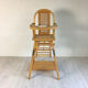 Chaise pour bébé vintage en bois et cannage