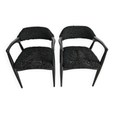 Pair of Mid Century Modern armchairs in astrakhan leather.