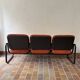 Strafor 3-seater bench, orange upholstery and sled base, 1970s.