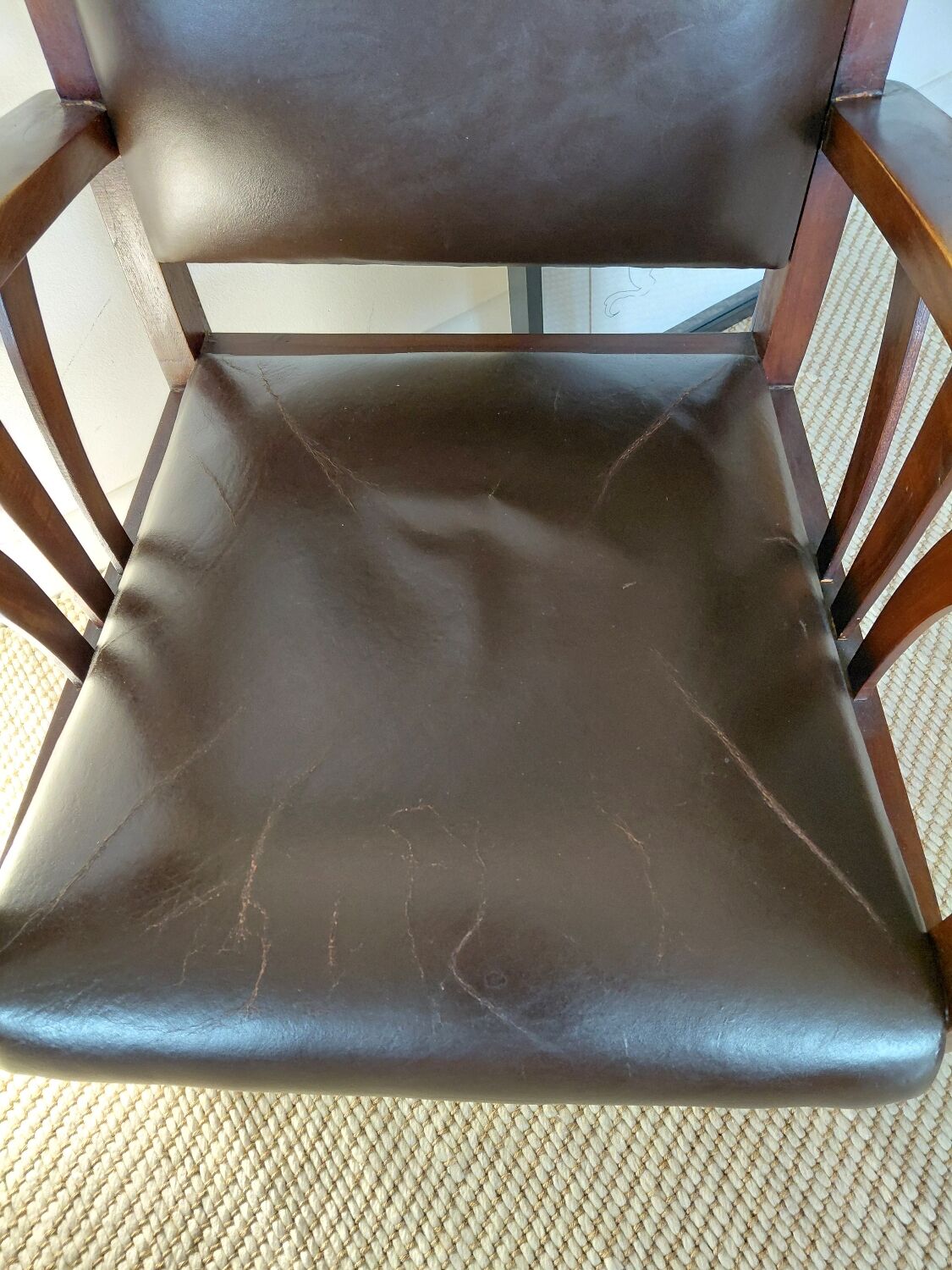 Colonial style wooden armchair