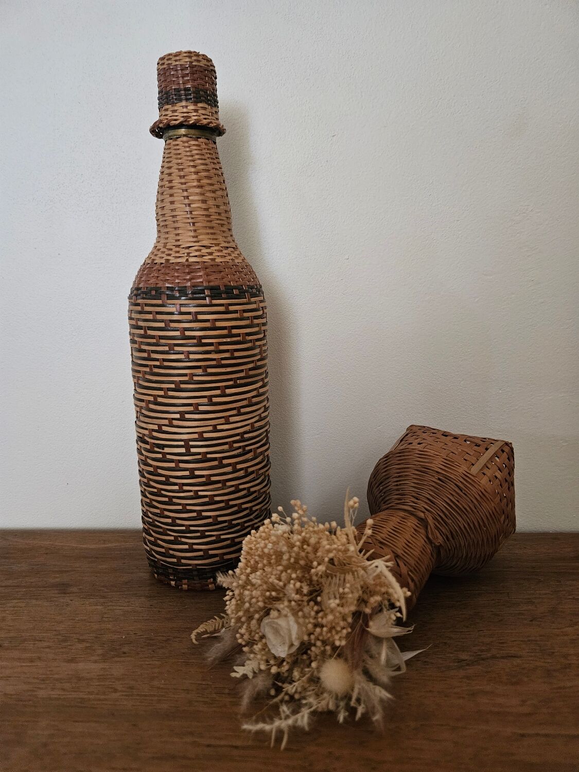 Glass and rattan bottle