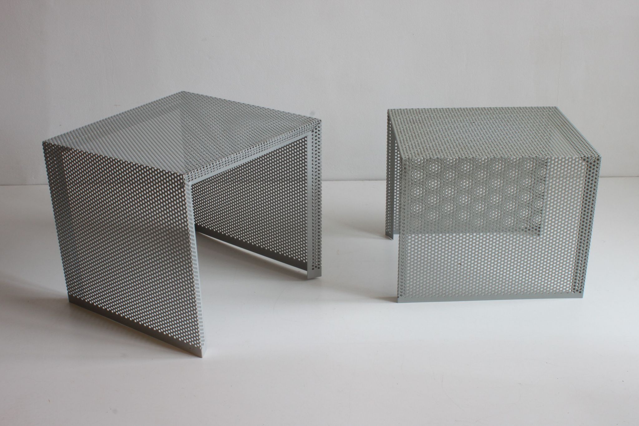 Grey perforated metal nesting side tables, 1990s set of two.