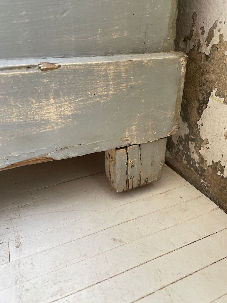 Blue patinated cap cabinet