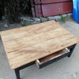 Wooden coffee table with a drawer