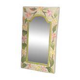 Carved wooden mirror, colourful floral decoration.