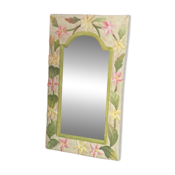 Carved wooden mirror, colourful floral decoration.