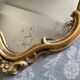 Old golden mirror in composite resin baroque style 60s