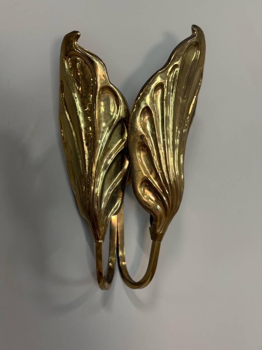 Set of four gilt brass wall lights, Tommaso Barbi, circa 1960.