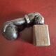 Cast iron door knocker from the 19th century or earlier.