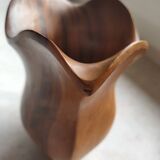 Olive wood pitcher.