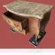 Curved commode