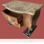 Curved commode