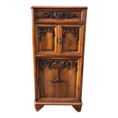 Art Deco sideboard bar cabinet in solid walnut with 3 doors and 1 richly carved tilting false drawer.