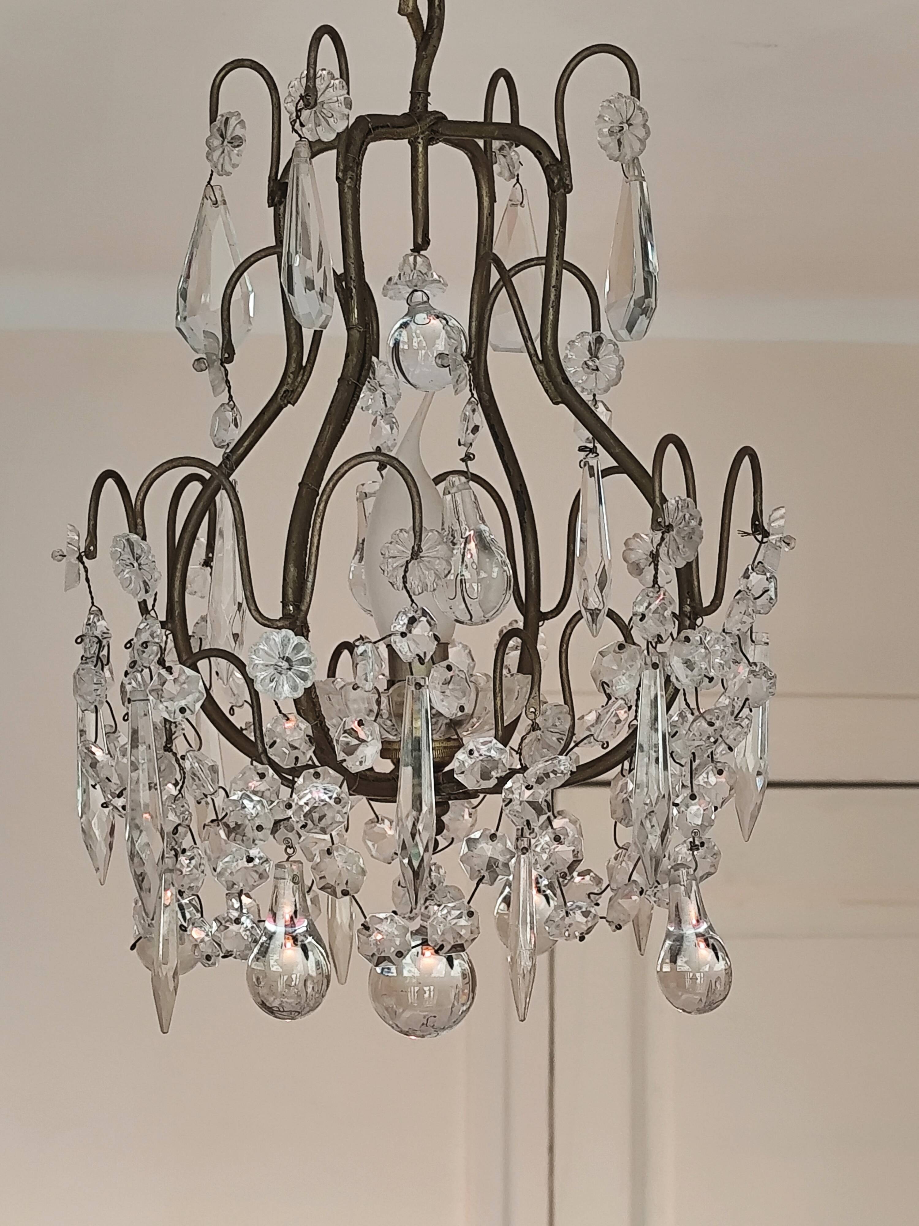 brass cage chandelier with crystal tassels