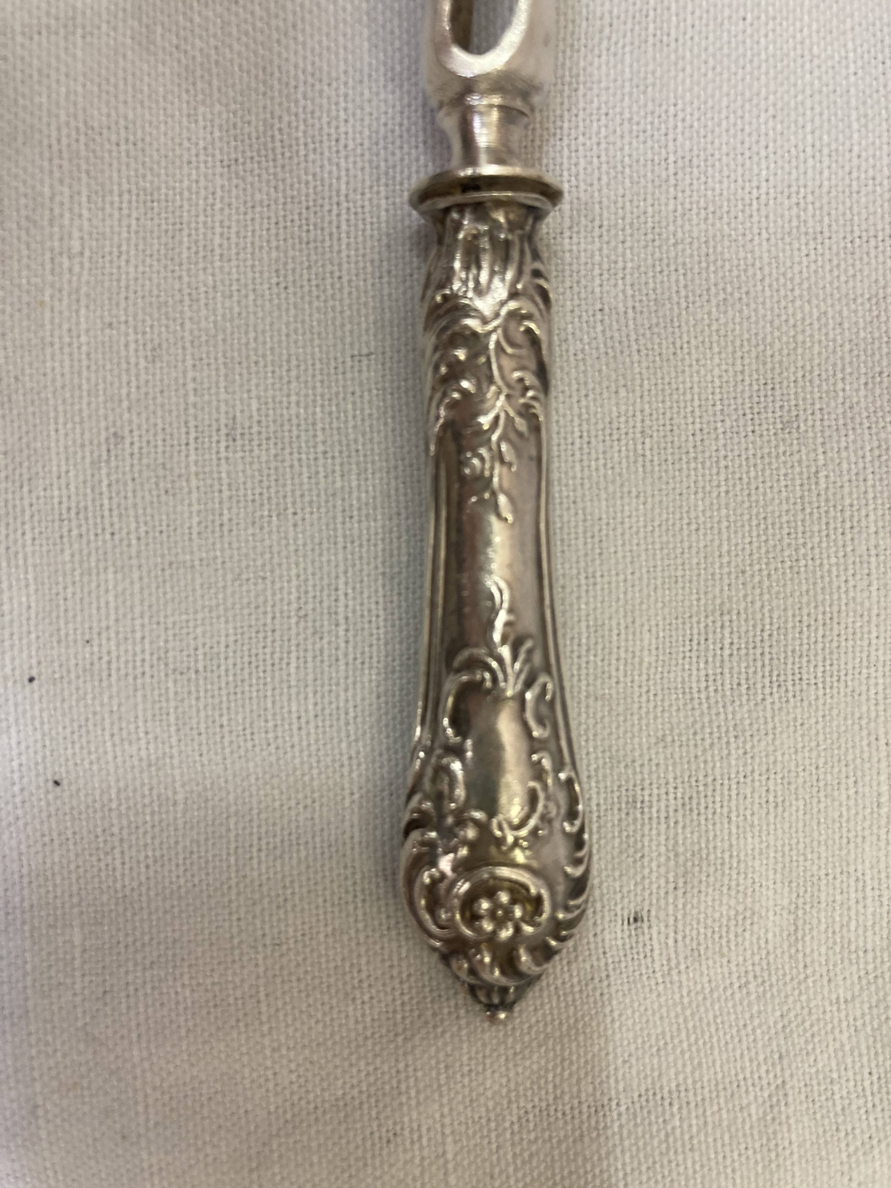 Silver duck sleeve clips, 19th century neck brace