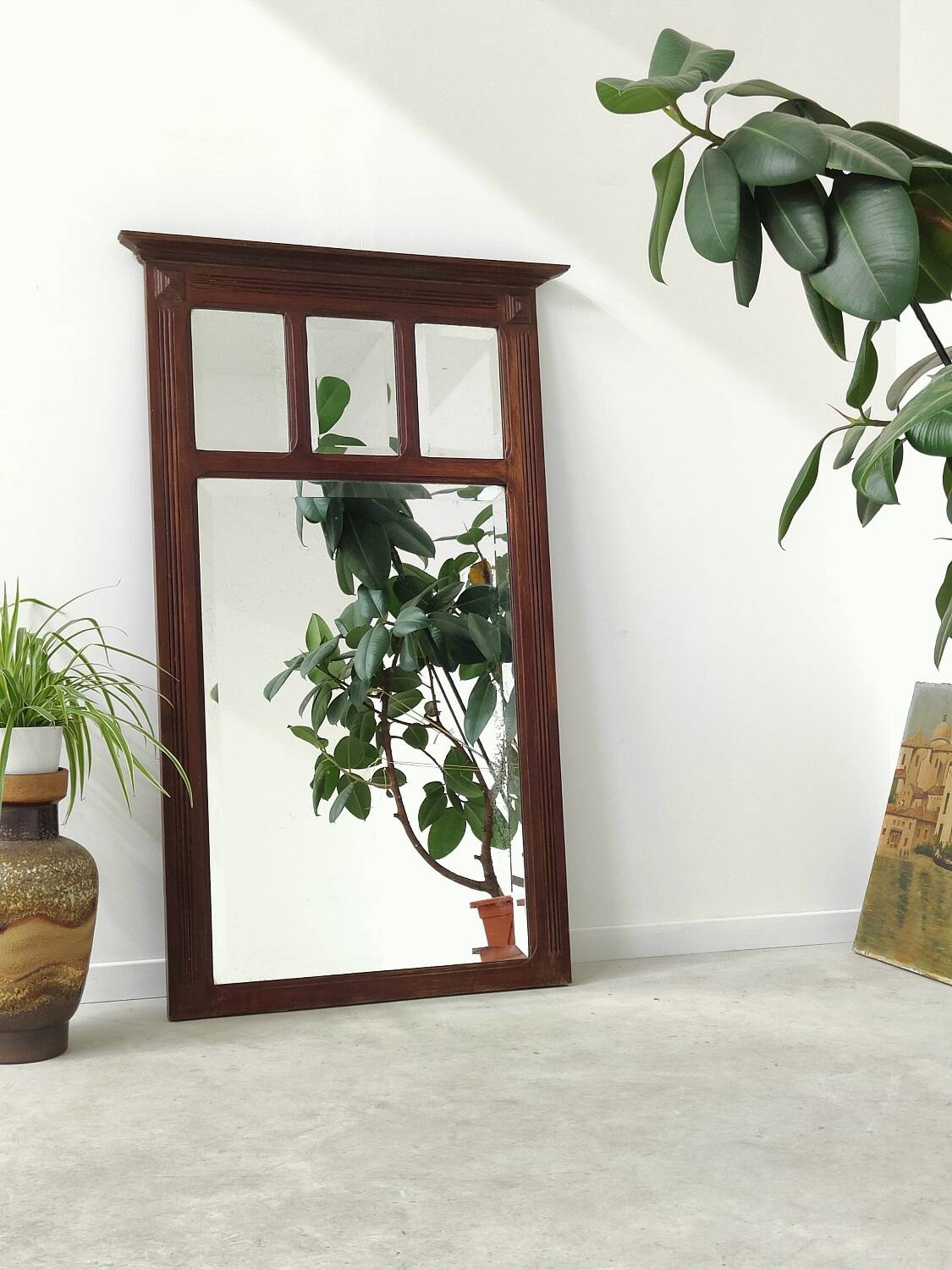 Antique beveled mirror on a wooden frame, 1930