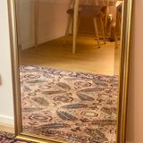 Beveled mirror with gold borders
