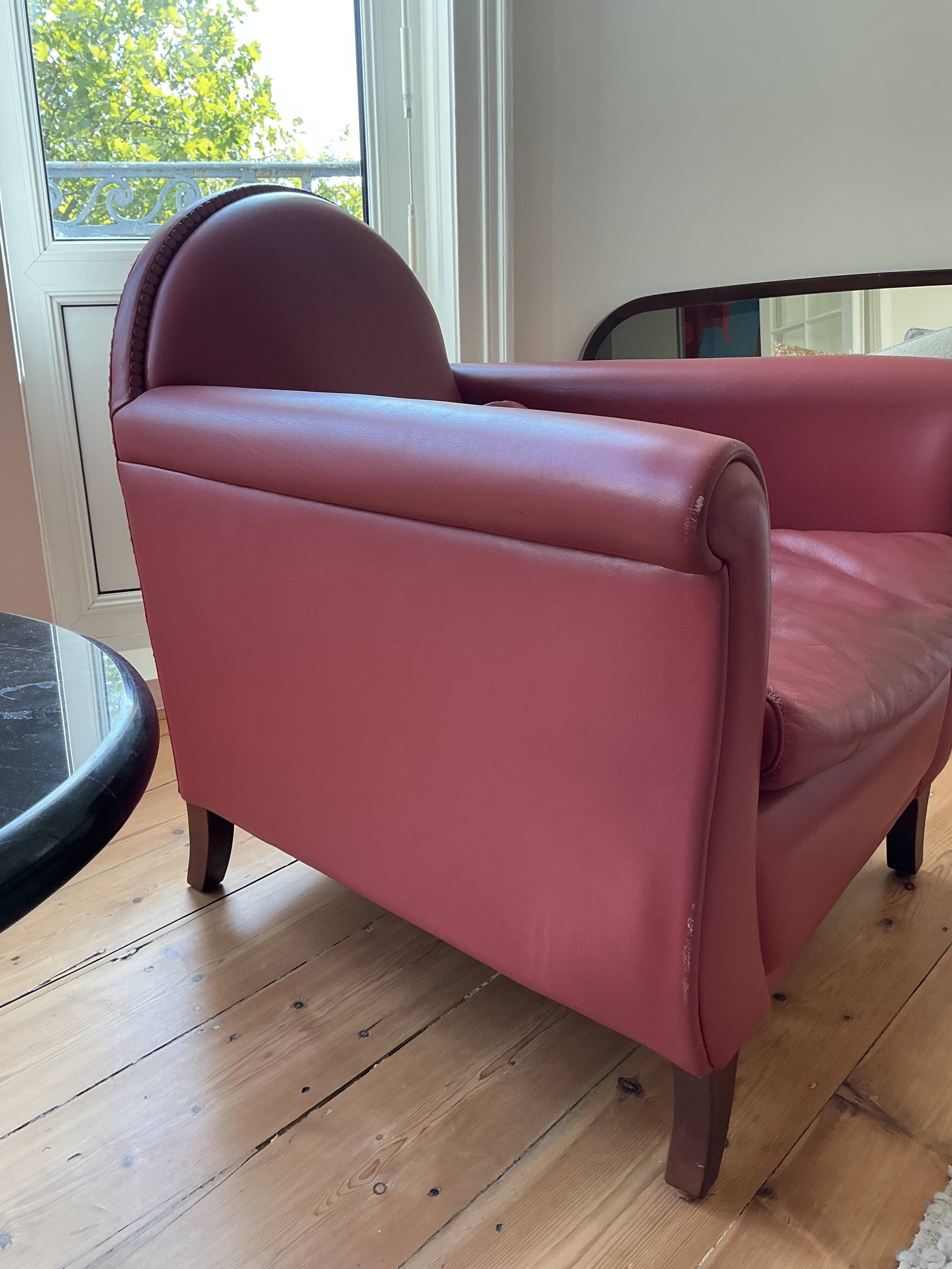 Pair of Lyra armchairs – Renzo Frau for Poltrona Frau – burgundy leather