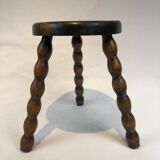 Dark turned wood tripod stool
