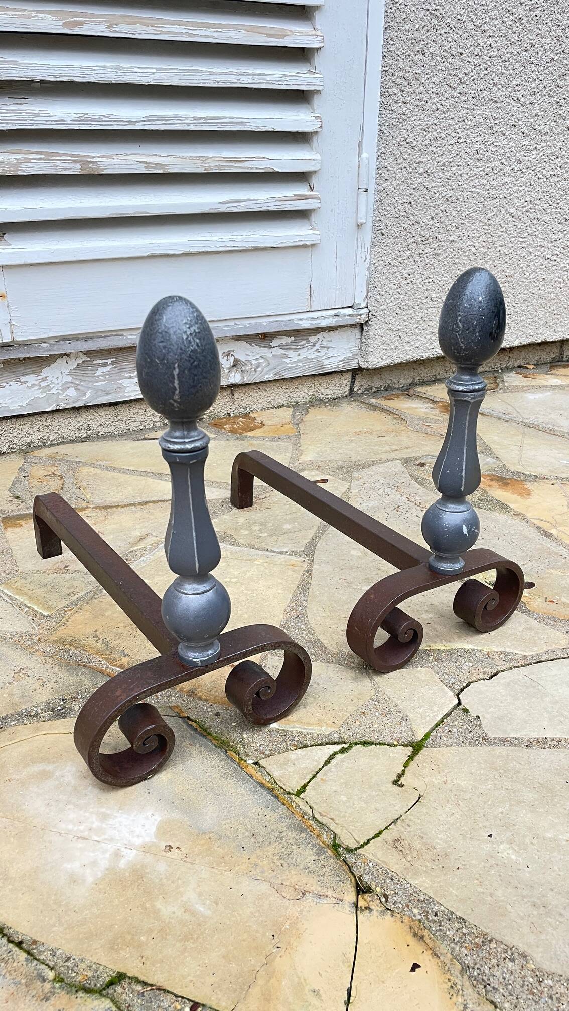 Pair of vintage geometric fire dogs