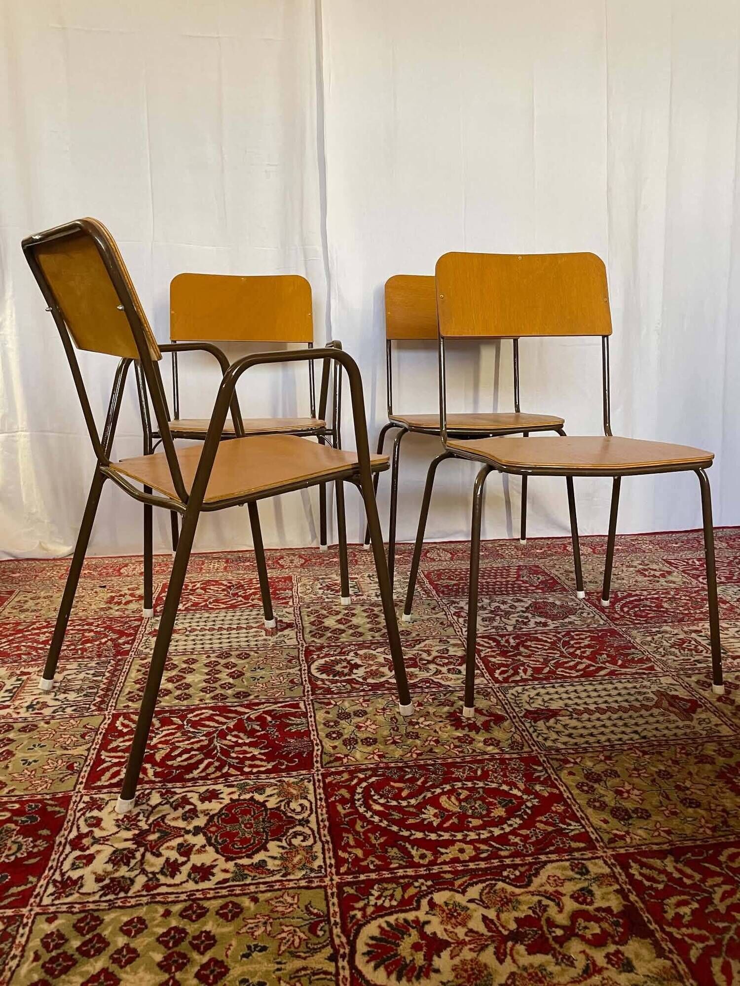 Set of 2 vintage school chairs and 2 armchairs.