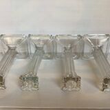 Four old square molded glass candlesticks