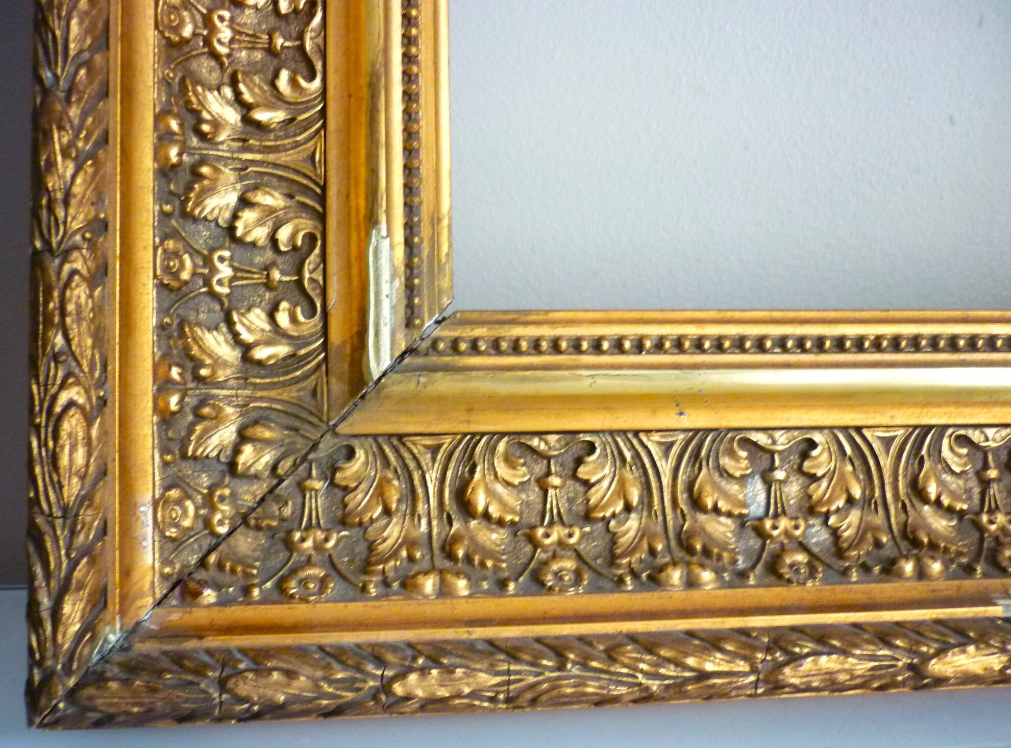 Antique gilded frame in wood and stucco, carved, original gilding