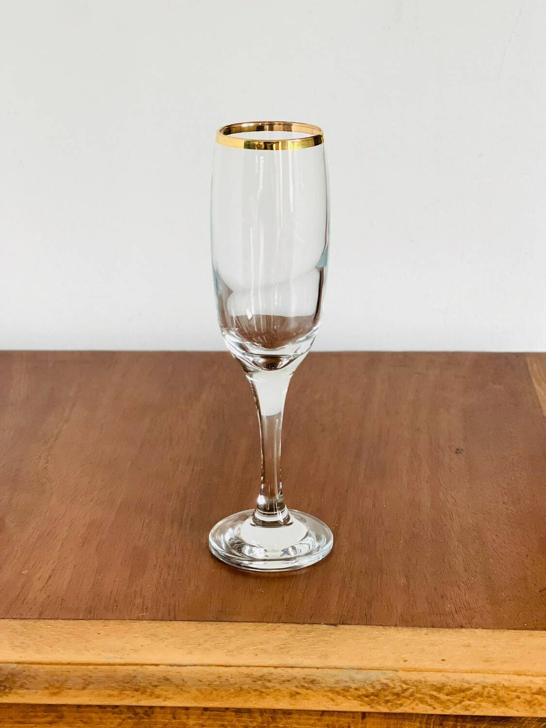 Gold rimmed champagne flutes