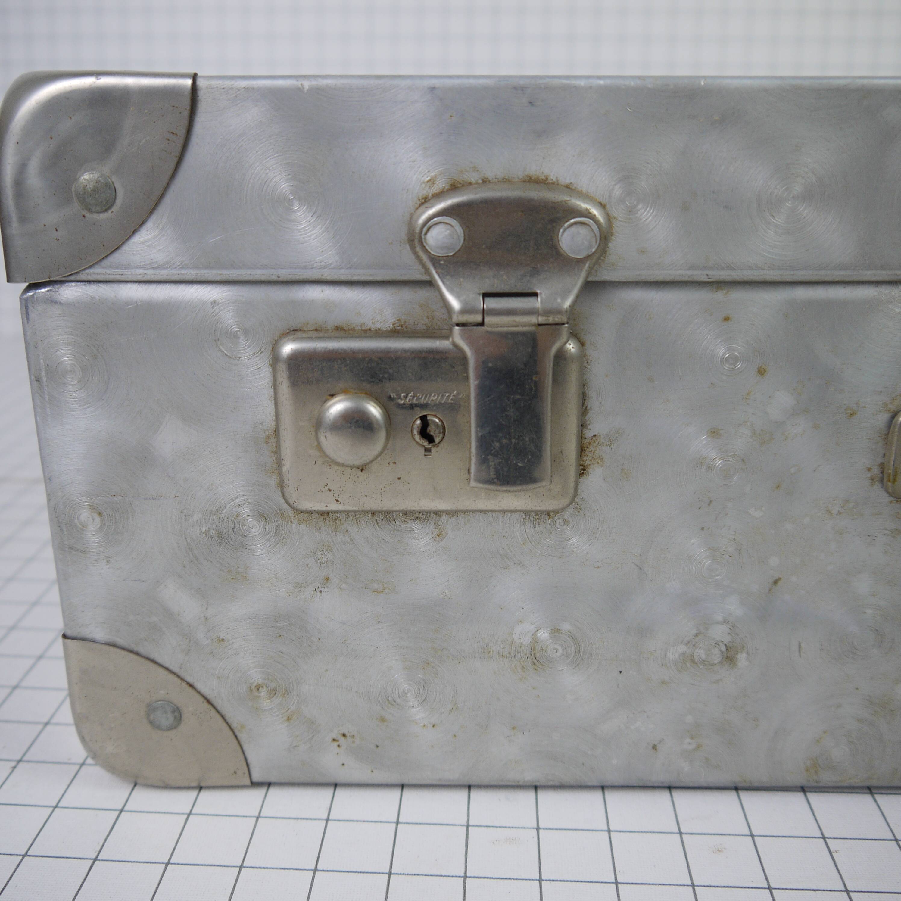 Metal case and leather handle