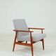 Armchair with striped fabric footrest, 1960