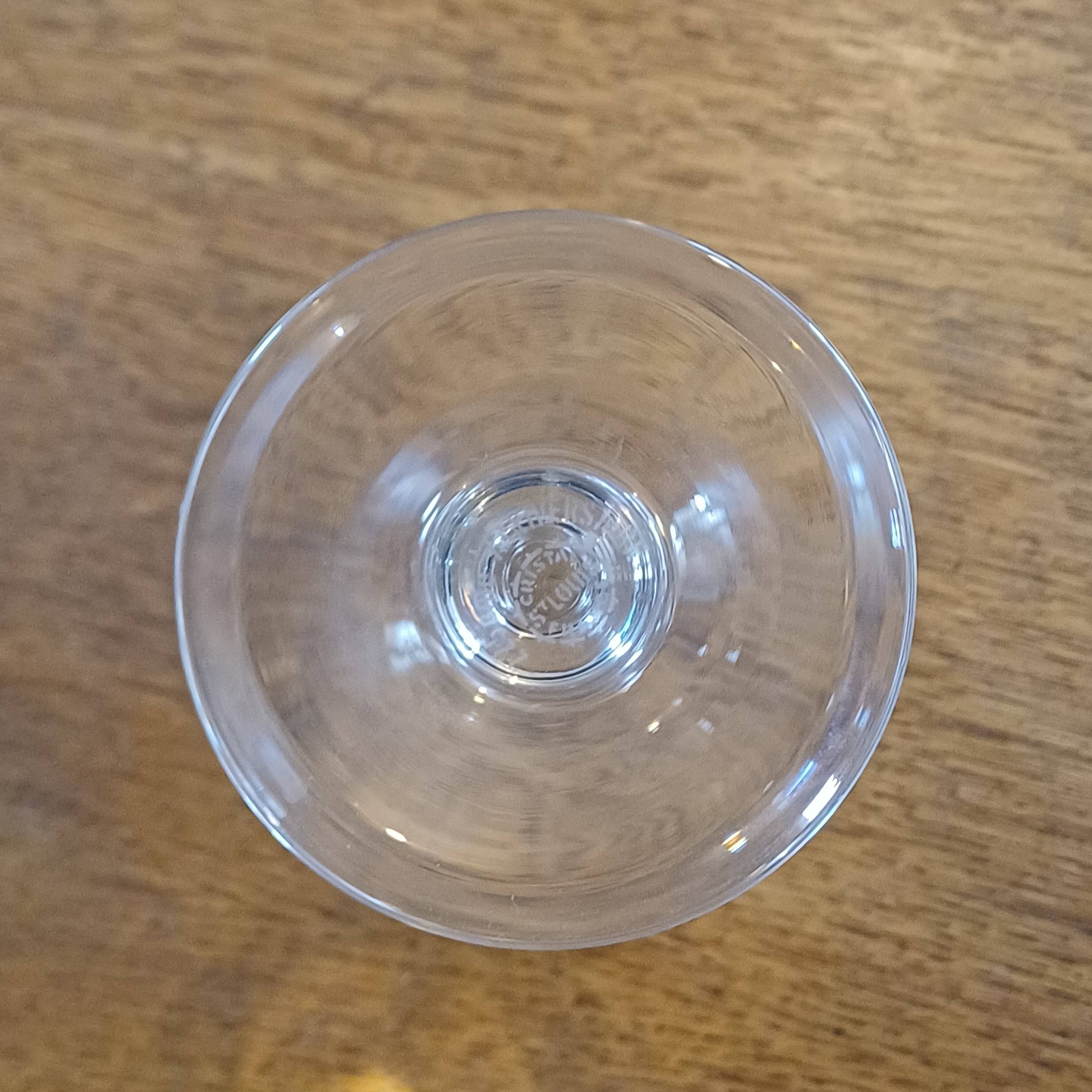 Set of St Louis glasses including 10 flutes, 12 wine glasses, and 12 water glasses.