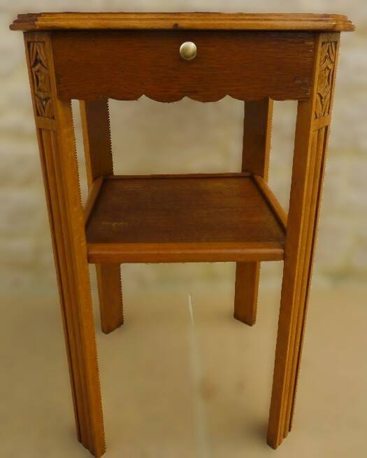 Small art deco style piece of furniture with one drawer and one shelf