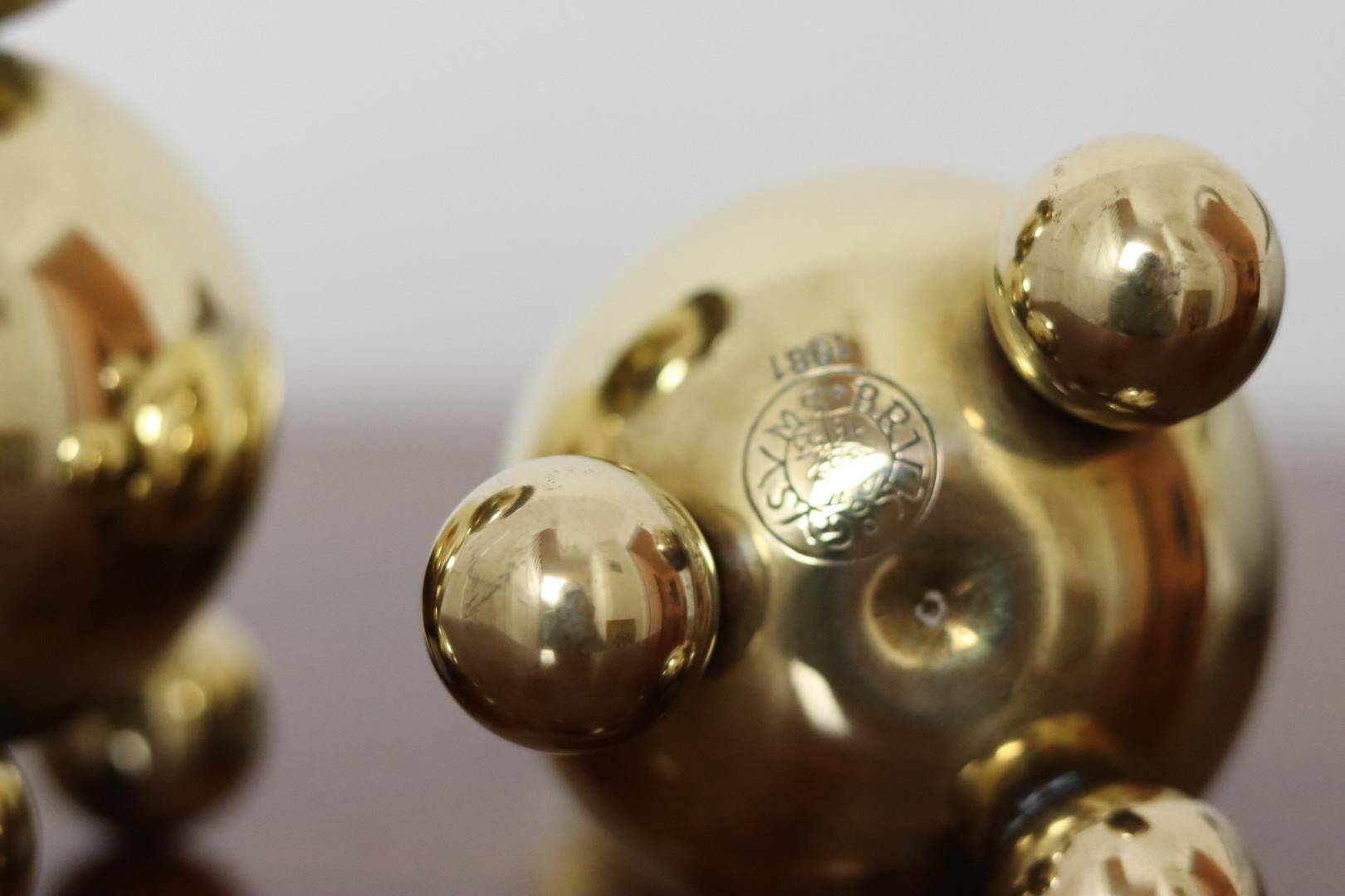 Pair of Swedish brass candlesticks from the mid-century by Gusum.