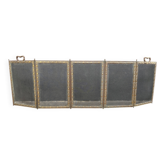 Antique fireplace screen in copper and brass from the 19th century.