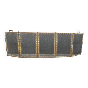 Antique fireplace screen in copper and brass from the 19th century.