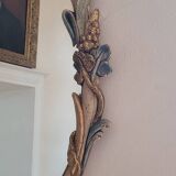 Mirror and its carved wooden sconces