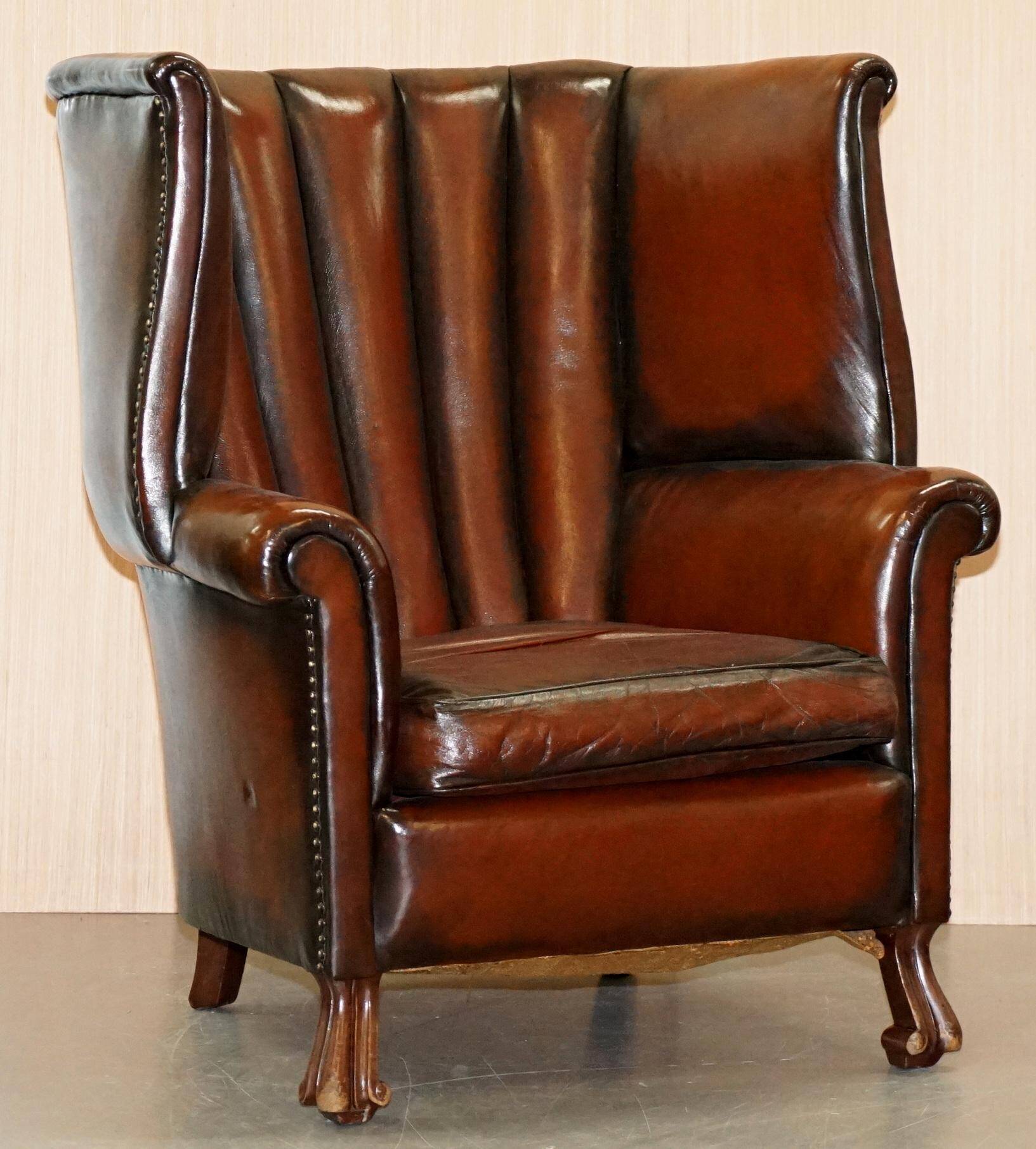 Victorian leather canapé and armchair, barrel back, circa 1860, restored.
