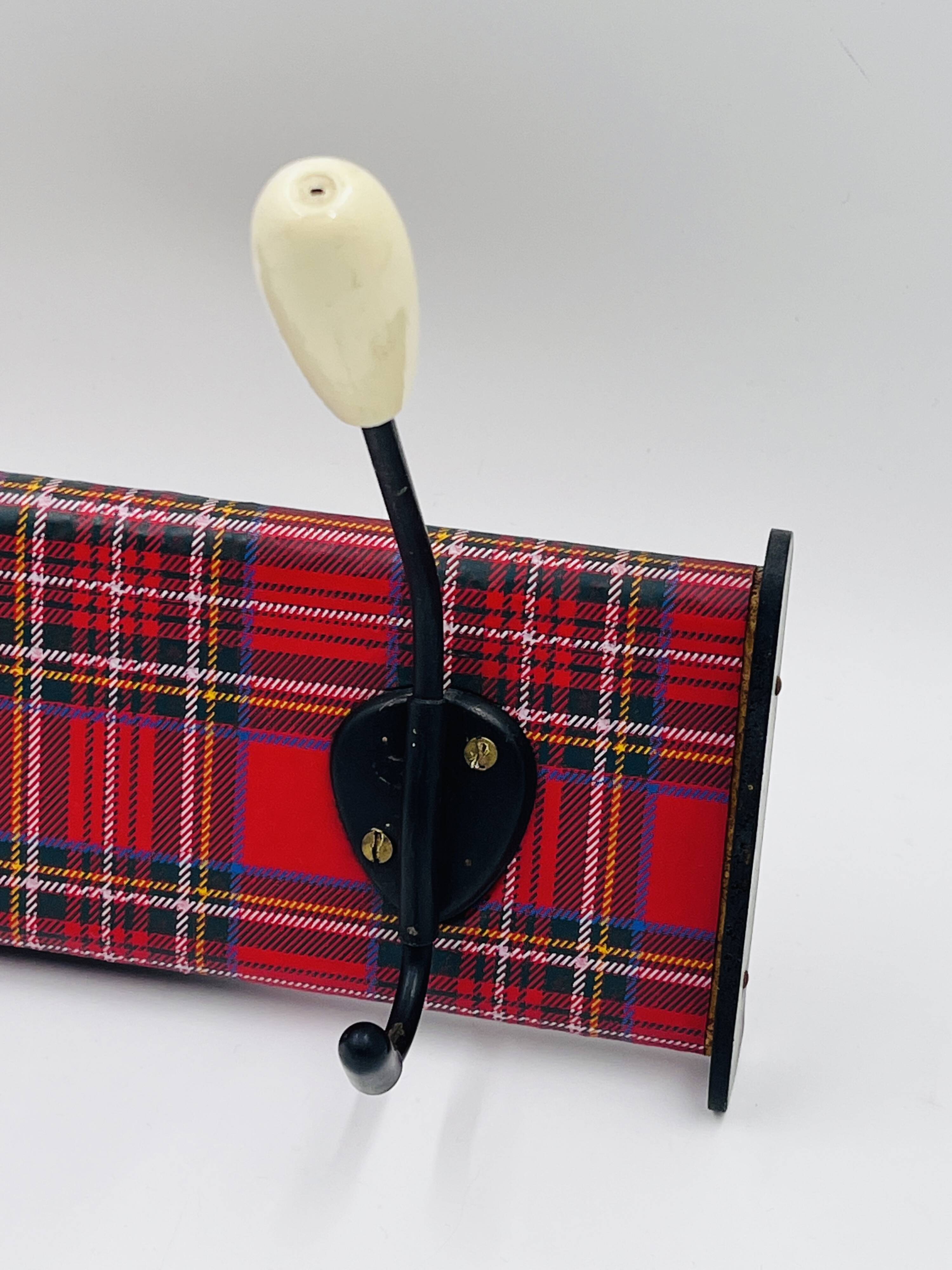 Vintage red Scottish coat rack from the 1970s.
