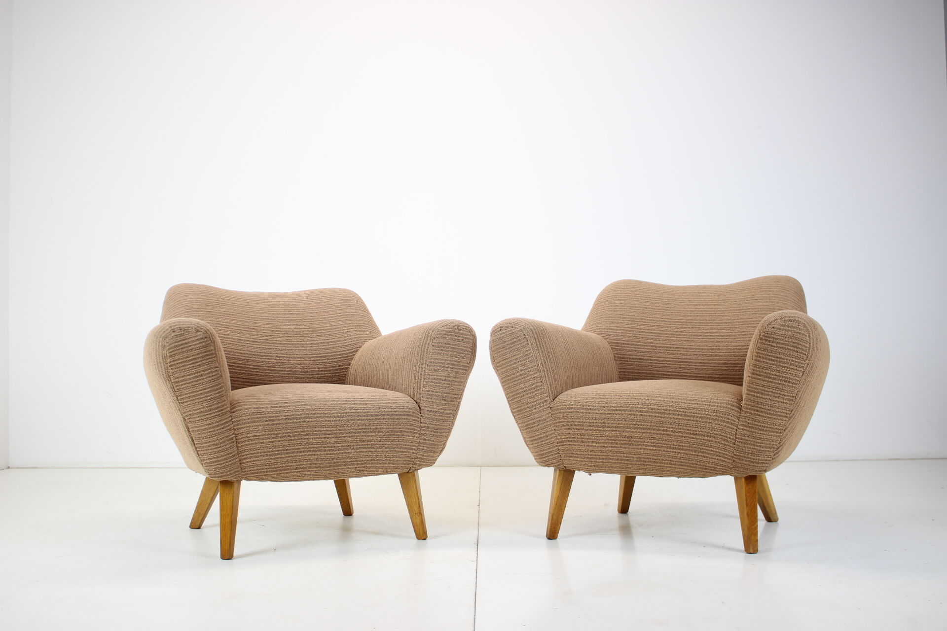 Pair of design club armchairs, 1970's.