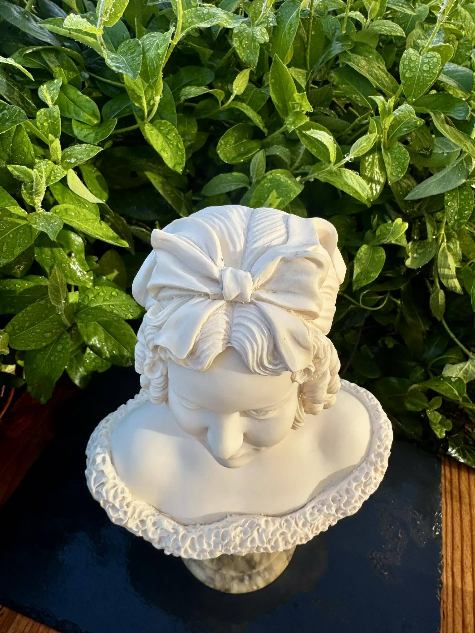 Bust of a woman signed Arnaldo Giannelli dated 1972.