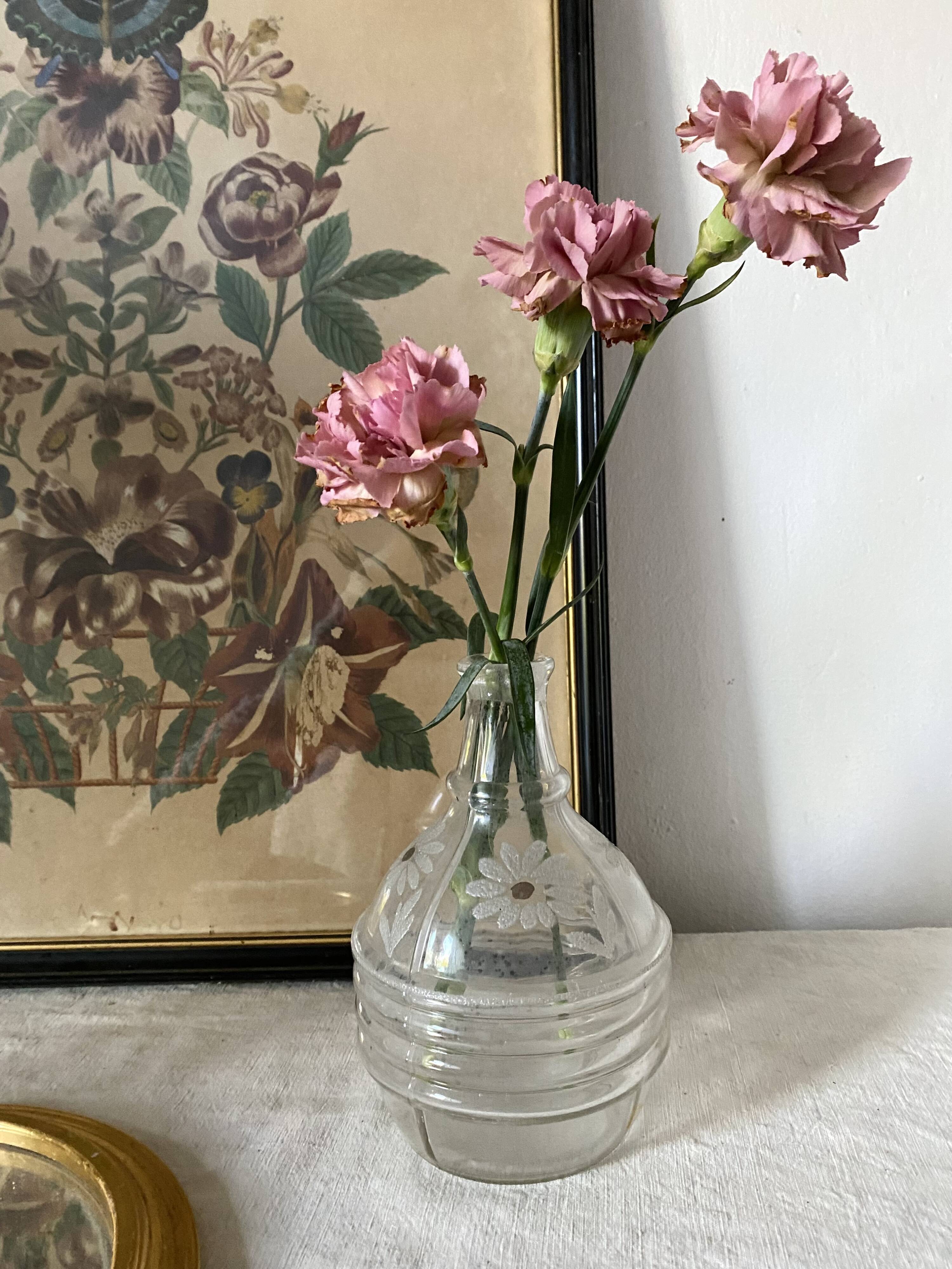 Antique carafe, daisy-decorated vase